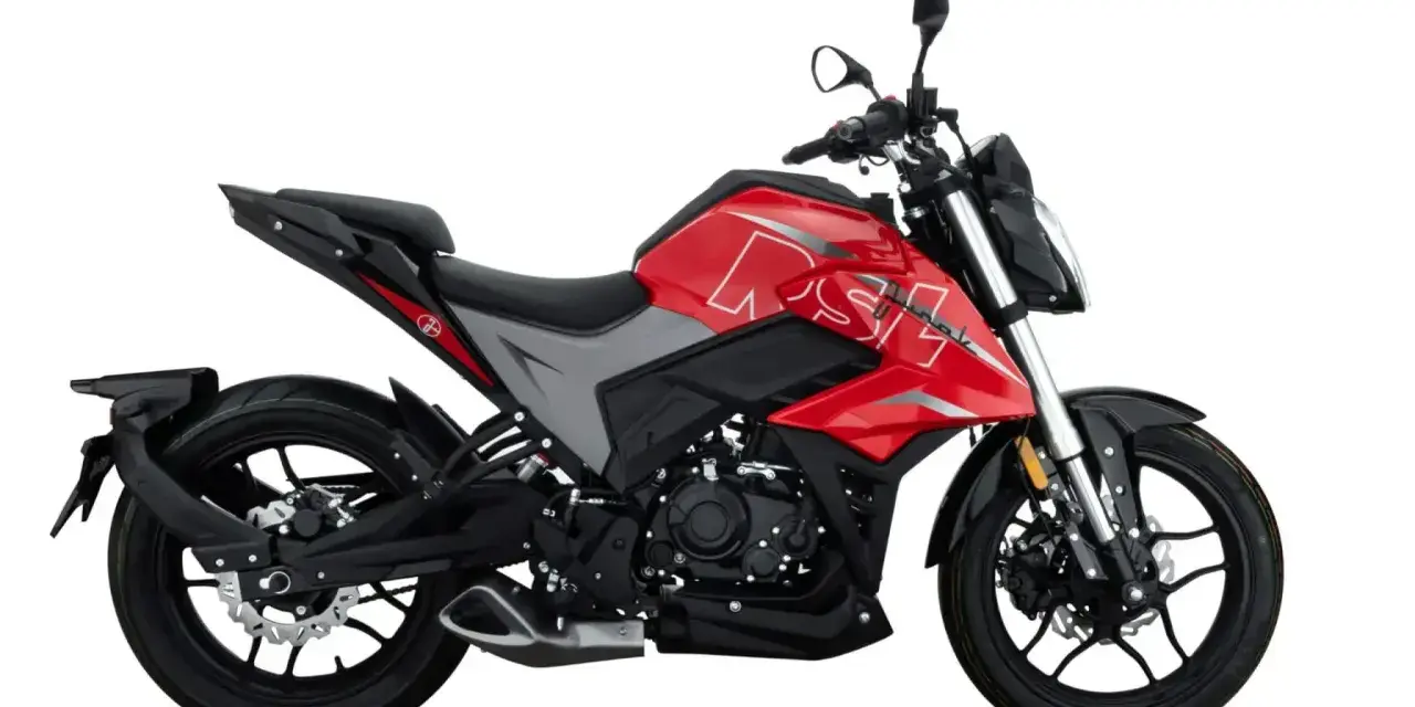 Sportowy motocykl w kolorze czerwono-szarym, idealny na pierwsze prawo jazdy a1.